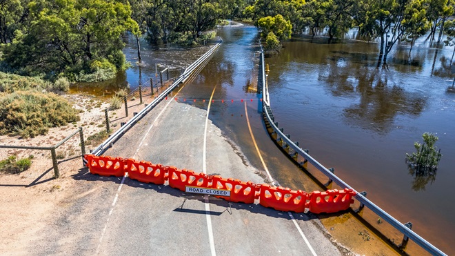 flood_waters_over_australian_road